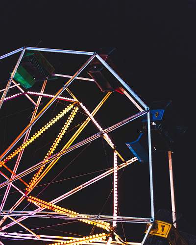 amusement park Ferris wheel during night bow